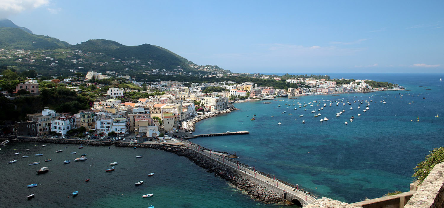 Ischia yacht charter view of a town and the ocean