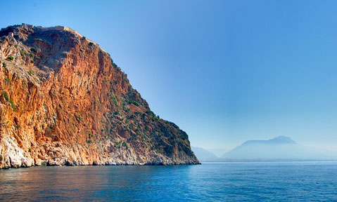 Türkbükü yacht charter rock cliff overlooks sea