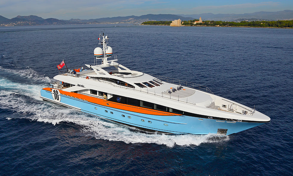 Brightly coloured 37M AURELIA cruises on blue ocean